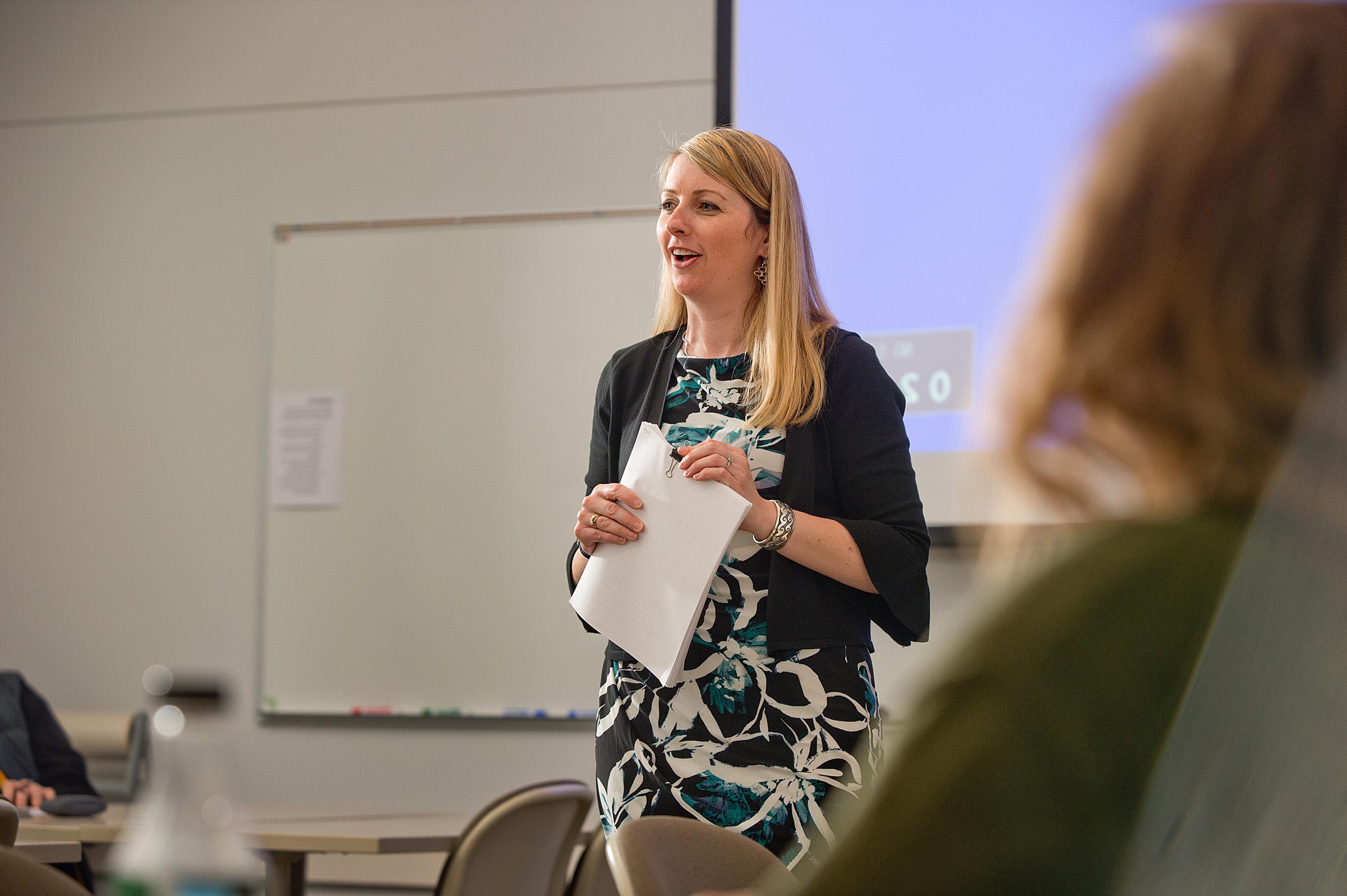 Melissa Askren-Edgehouse teaching students in a classroom 